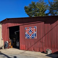 The Antique Barn & Artisan Marketplace logo