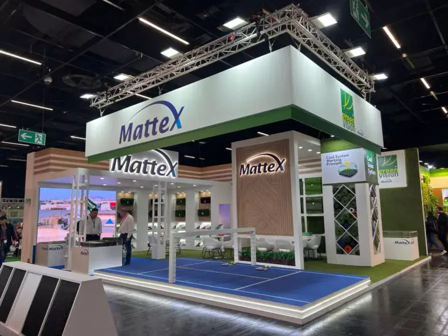 Large custom-built exhibition stand with open sightlines and clear brand signage